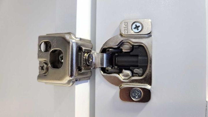 Hinge close-up in a Canada Kitchens cabinet