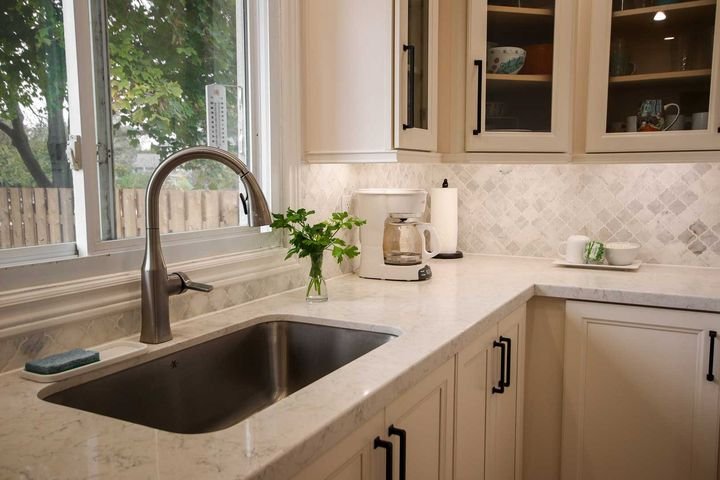 Corner sink with glass uppers, Canada Kitchens cabinets