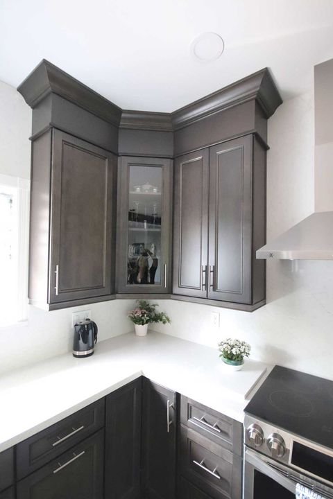 Corner wall cabinets with crown moulding, London Grey cabinets by Canada Kitchens