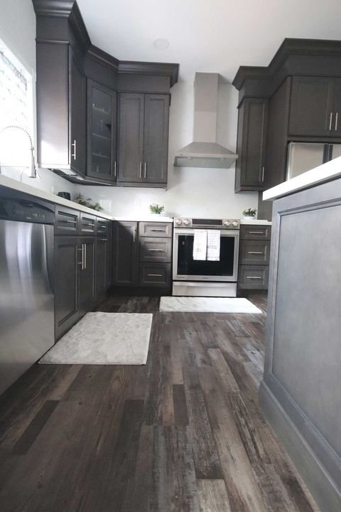 Range wall and tall pantry, London Grey cabinets by Canada Kitchens