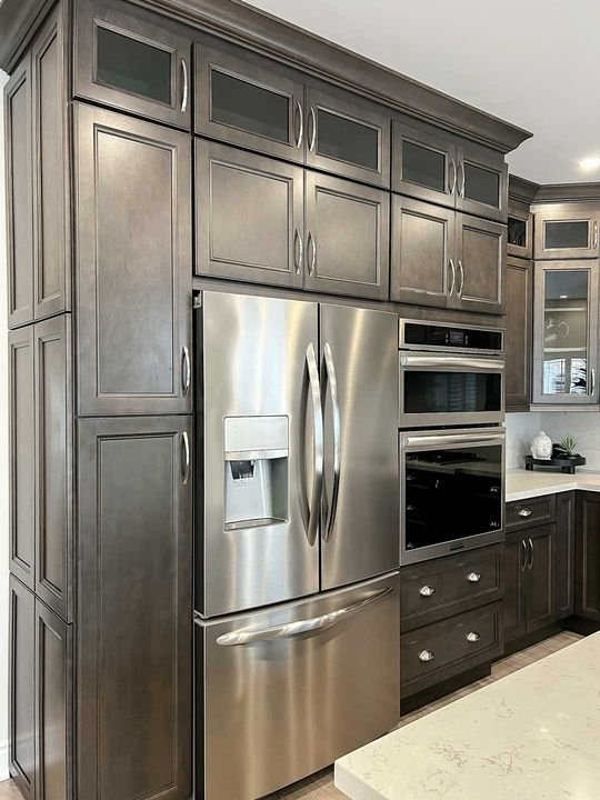 Pantry beside the fridge, London Grey cabinets by Canada Kitchens