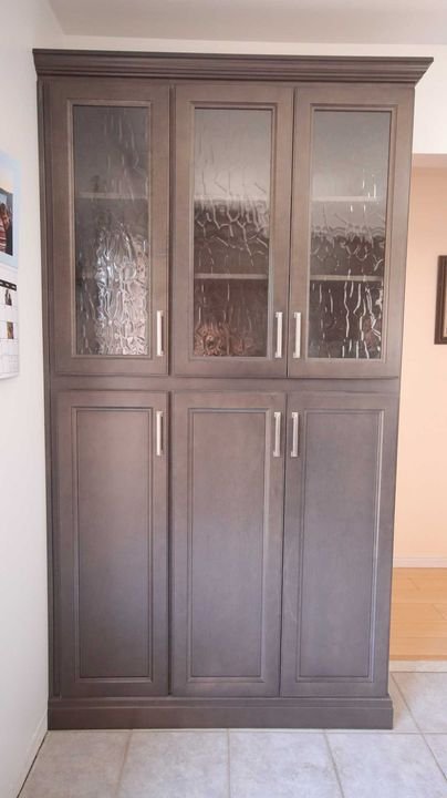 Pantry with glass upper doors, London Grey cabinets by Canada Kitchens