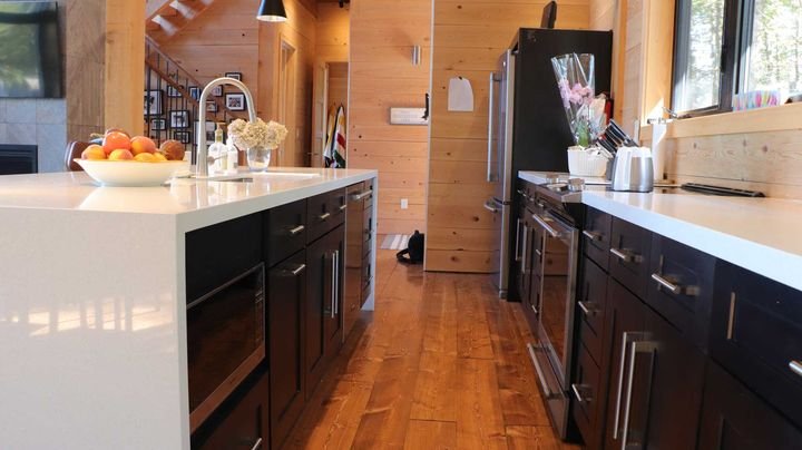 Waterfall island, Shaker Charcoal cabinets by Canada Kitchens