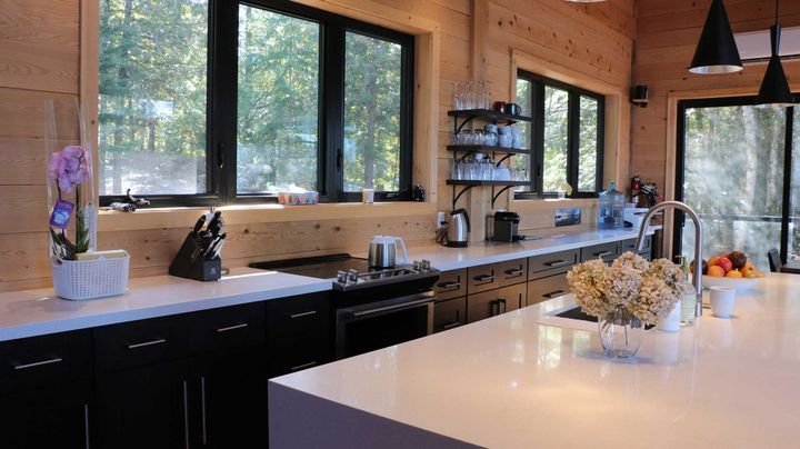 Long counter run under a row of windows, Shaker Charcoal cabinets by Canada Kitchens