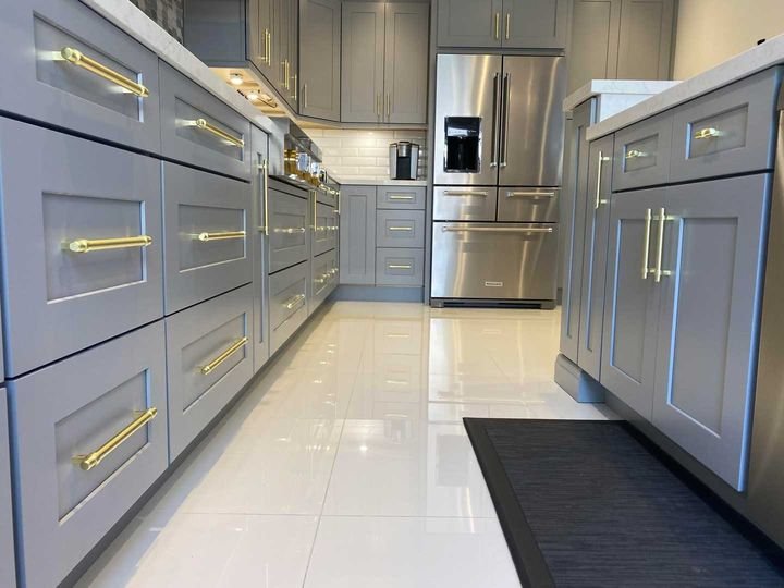 Long cabinet run with brass pulls, Shaker Grey cabinets by Canada Kitchens