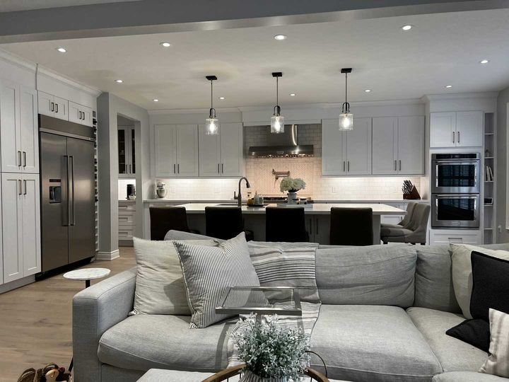 Kitchen seen from the living room, Shaker White cabinets by Canada Kitchens