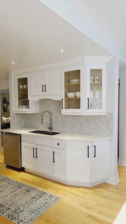 Sink side of a galley kitchen, Canada Kitchens cabinets